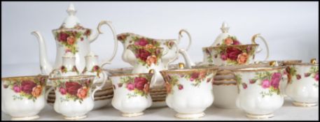 A Royal Albert Old Country Roses pattern part tea service comprising cups, saucers, plates etc.