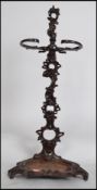 A vintage 20th century cast iron Coalbrokedale style stick / umbrella stand having a painted