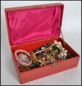 A good group of vintage costume jewellery to include necklaces, bangles, beads, rings, rhinestone