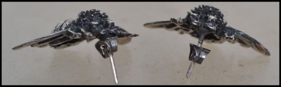 A pair of Mexican silver figural earrings in the form of bumble bees having post backs. Measure