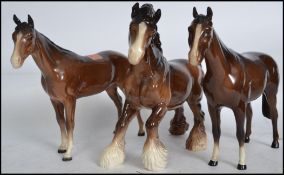 A group of three 20th century Beswick ceramic horses / fowls to include a Beswick Shire horse.