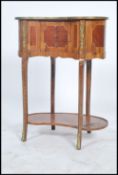A French Marquetry Inlaid Kidney Shaped Side Table, with brass gallery above a series of frieze