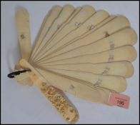 A 19th century ladies fan made of ivory and in the manner of Dieppe. The fan with many blades having