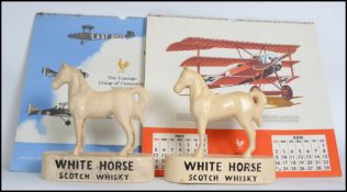Breweriana a pair of pottery White Horse Scotch Whisky point of sale advertising models measuring