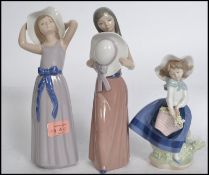 A collection of Lladro figurines ( 5 total )to inc