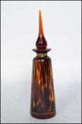 A stunning 1930's Art Deco ladies glass perfume bottle of tapering form with large finial stopper,