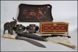 A dealers lot to include a Japanese chinoserie tray together with a bone and peacock feather