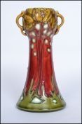 A fantastic early 20th century Minton Ltd No 41 secessionist twin handled vase of tapering form