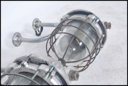 A pair of Industrial ' extreme condition ' heavy industrial bulkhead lights. Each with glass pendant