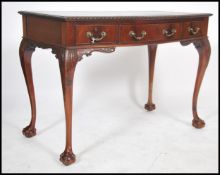 A Queen Anne revival mahogany writing table desk b