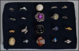 A collection of 20 vintage costume jewellery and other rings to include rhinestone, cameo, white