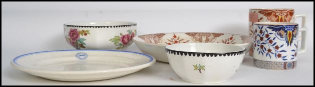 A good collection of Bristol ceramics by Pountney. To include large oversize mug and bowl set,