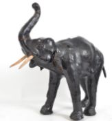 A good 20th century leather covered elephant compl