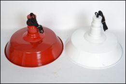 A pair of ( Different colours ) vintage retro industrial pendant ceiling lights, one having a red