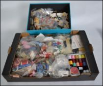 A fantastic collection of vintage and retro buttons and sewing accessories to include several cotton