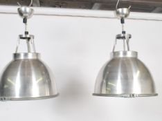 A Vintage mid century BTC industrial polished aluminium factory pendant light of spherical form with