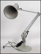 A retro 1970's grey Herbert Terry anglepoise Industrial desk lamp having pendant shade and