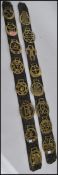 A pair of 20th century vintage equestrian/ horse riding martingales of long form, each having 8