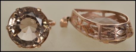 A vintage 9ct gold dress ring set with a round cut smokey quartz  (size S)  marked 9ct together with