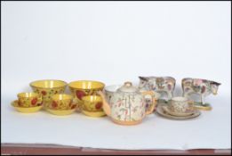 A collection of 19th century Victorian ceramics to include a pair of Staffordshire fireside cows