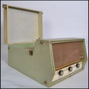 A vintage retro mid 20th century Dansette Conquest Auto four speed record player having a twin