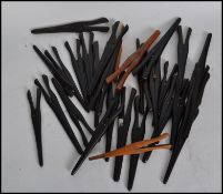 A collection of approx 30 Victorian and Edwardian vintage glove stretchers of typical form in