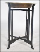 A 20th century Chinese brass topped occasional table, the brass top having a sunken central recess