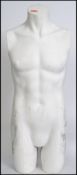 A vintage 20th century shop advertising / point of sale display male torso mannequin in white.