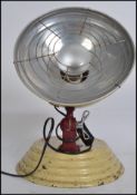 A retro 1950's Bridge & Co beehive style desk lamp being recently converted. The space age style