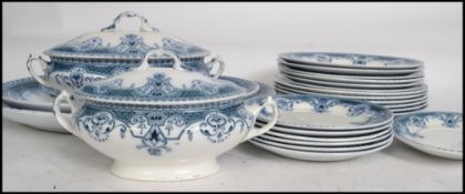 A 19th century Bristol Pountney blue and white part dinner service to include large and small