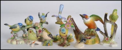 A collection of ceramic  bird figurines to include Goebel, Royal Adderlay please refer to images.