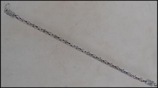 A 925 silver Byzantine bracelet with hook clasp. Weight 28g. Measures 24cms.
