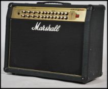 A Marshall Valvestate 2000 ' AVT 275 ' large guitar amplifier. With Marshall logo to front. Vendor
