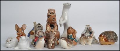 A collection of ceramic animal figures by various makers to include Royal Copenhagen, USSR,