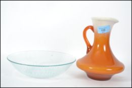 A vintage 1950's modernist glass bowl decorated wi