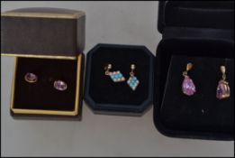 A collection of gold ladies earrings to include amethyst drop earrings in box, Turquoise and seed