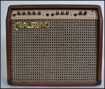 A vintage Carlsbro ' Sherwood Baby ' guitar amp, in tan. Vendor assures us amplifier is in full