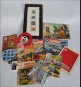 A collection of retro and vintage items to include a Rubiks Clock, comics, stamps, car magazines