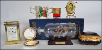 A collection of items to include a boxed ' Mayflower ' ship in a bottle, carriage clock by