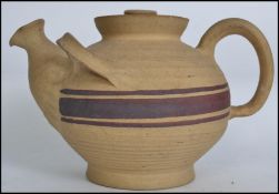 A vintage early 20th century studio art pottery teapot by Kahler Keramik of Denmark c1925 having
