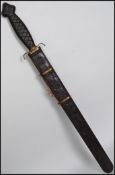 A 20th century Chinese bronze style Jian sword, the double edged blade with central ridge, having