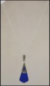An Art Deco style ladies Lapis Lazuli agate pendant and necklace chain. The Lapis drop with