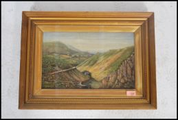 An Edwardian oil on canvas painting of believed Boer war scene with soldiers marching on path to