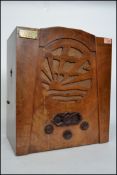 A vintage 20th century Art Deco Pye walnut cased radio model P/B 1933 having a five valve battery.