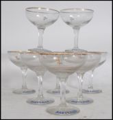 A set of 8 mid 20th century retro Babycham glasses having shaped bowls raised on hexagonal stems