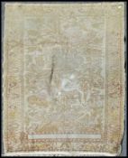 A 19th century Persian silk rug with central tree