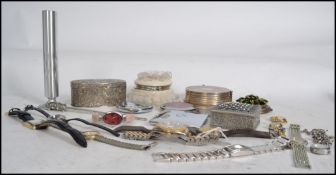 A collection of vintage watches to include Dila watch along with a group of vintage compacts and