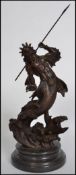 A fabulous bronze figure study of Neptune with trident standing over a  stormy sea being set onto