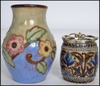 A Doulton Lambeth 1882-1889 stonewear lidded conserve pot in the form of a barrel having silver