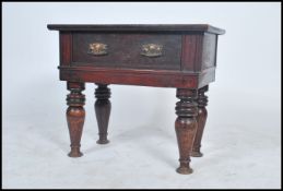 An low antique low occasional table of unusual construction with a single full length drawer with